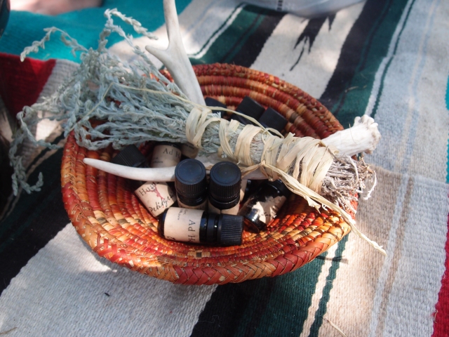 Our sacred oils and locally gathered sage with an antler I found on a beautiful morning walk, that later was included in Bec's bouquet. 