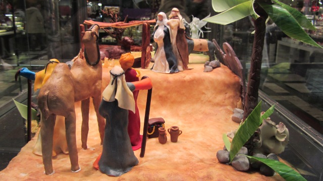 A marzipan nativity scene in a cake shop window