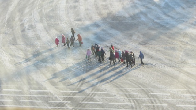 A group of schoolchildren crossing Palace Square, from the window of the Hermitage