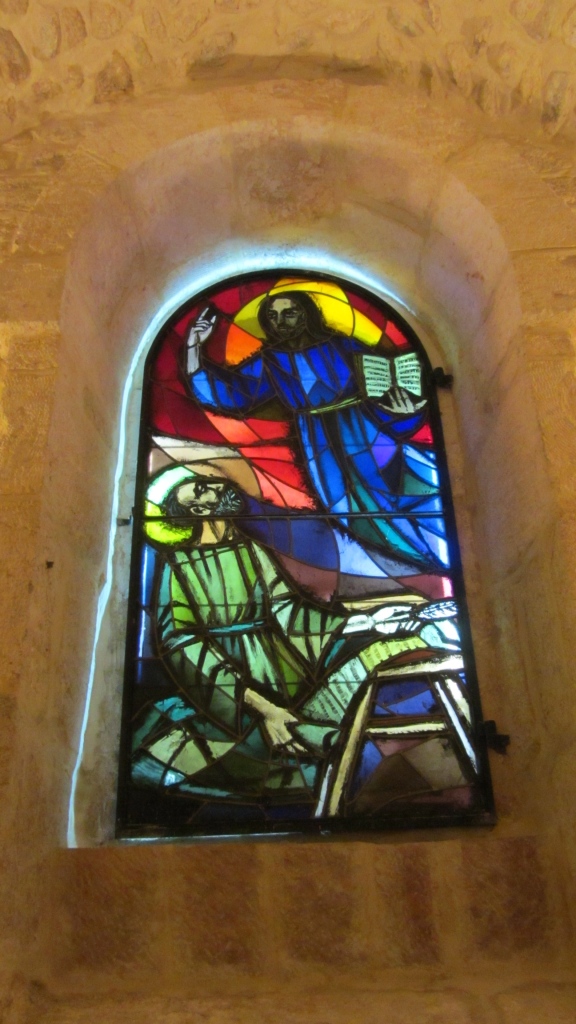 Lovely stained glass in a chapel of the Catholic church