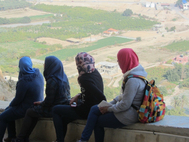 Palestinian girls looking down from the monastery