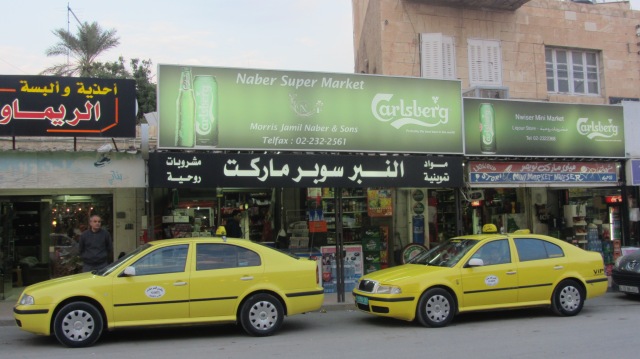 Rather smart taxi rank outside shops in Jericho