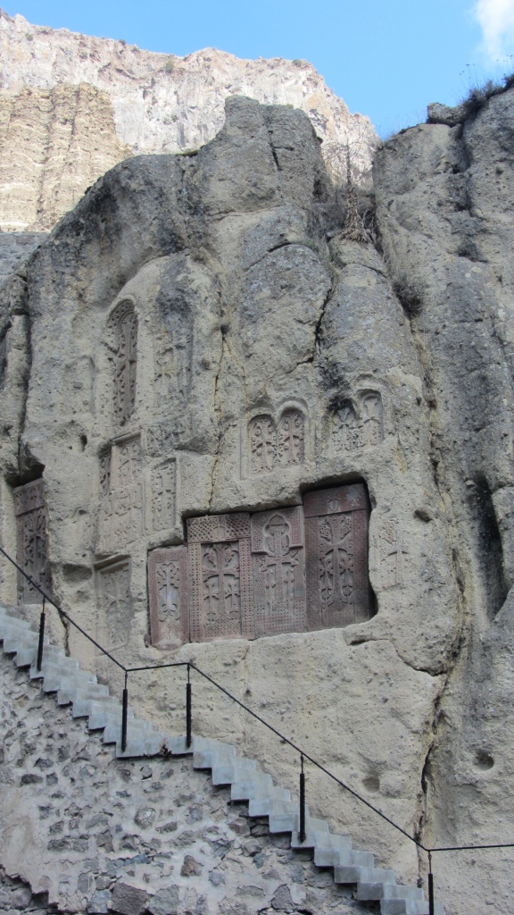Steps up to the monks cells, which are carved out of the rock